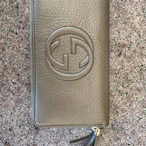 Gucci gold wallet